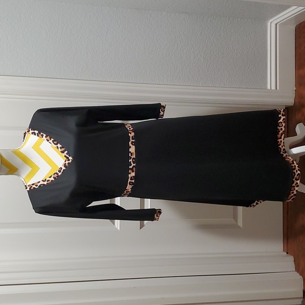Women's dress in Black with lepard trim